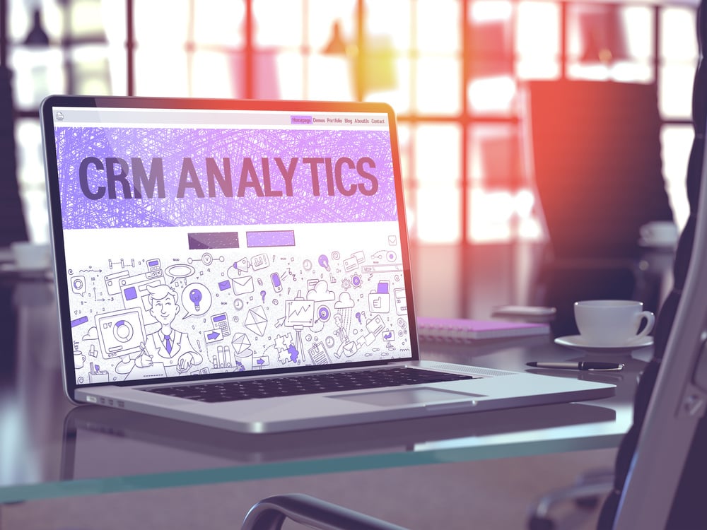 CRM Analytics - Closeup Landing Page in Doodle Design Style on Laptop Screen. On Background of Comfortable Working Place in Modern Office. Toned, Blurred Image. 3D Render. CRM Analytics - Closeup Landing Page in Doodle Design Style on Laptop Screen. On Background of Comfortable Working Place in Modern Office. Toned, Blurred Image. 3D Render.